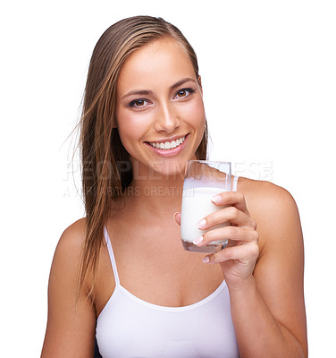 Buy stock photo Portrait, smile and woman drinking milk in studio, isolated white background and healthy diet. Face of female model, glass and organic dairy for breakfast, protein and calcium, wellness and vitamins 