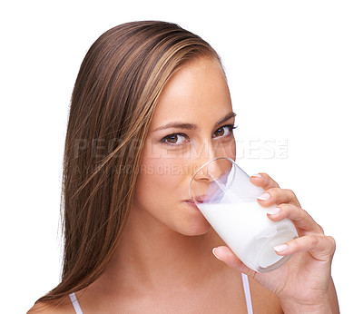 Buy stock photo Milk drink, glass and portrait of woman with white background, isolated studio and healthy diet. Face of female model, dairy product and organic breakfast for protein, calcium or vitamins of wellness