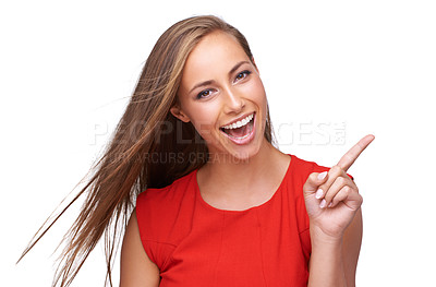 Buy stock photo Beauty, pointing finger and portrait of woman on a white background for fashion, marketing and advertising. Smile, cosmetics and girl point for deal, sale and product placement isolated in studio