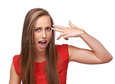 Buy stock photo Wow, hand and portrait of a woman with gun for shooting isolated on a white background in studio. Surprise, violence and girl with dark humor, finger rifle to shoot and pointing to head on a backdrop