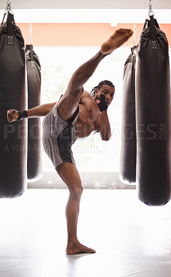 Buy stock photo Men, coach and mixed martial arts with training fight, gloves and punch pad for fitness in gym. People, combat and action for mma, boxing or hands for power, workout and exercise for competition