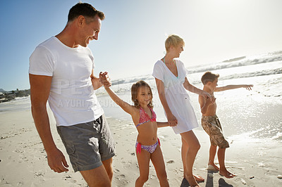 Buy stock photo Parents, children and holding hands on beach or relax vacation at seaside or holiday, bonding or connection. Mother, father and siblings in Florida for travel together or island, paradise or rest