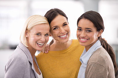 Buy stock photo Cropped portrait of three businesswomen standing in the office