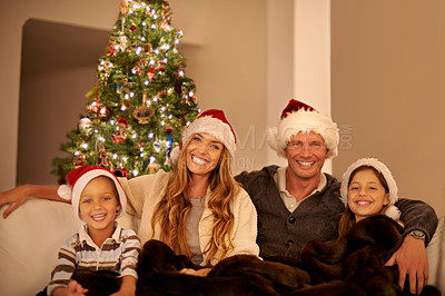Buy stock photo Christmas, holiday and family, portrait with love and happy together to celebrate at home, parents with children and smile. Mother, father and kids with happy family and Christmas tree decoration.