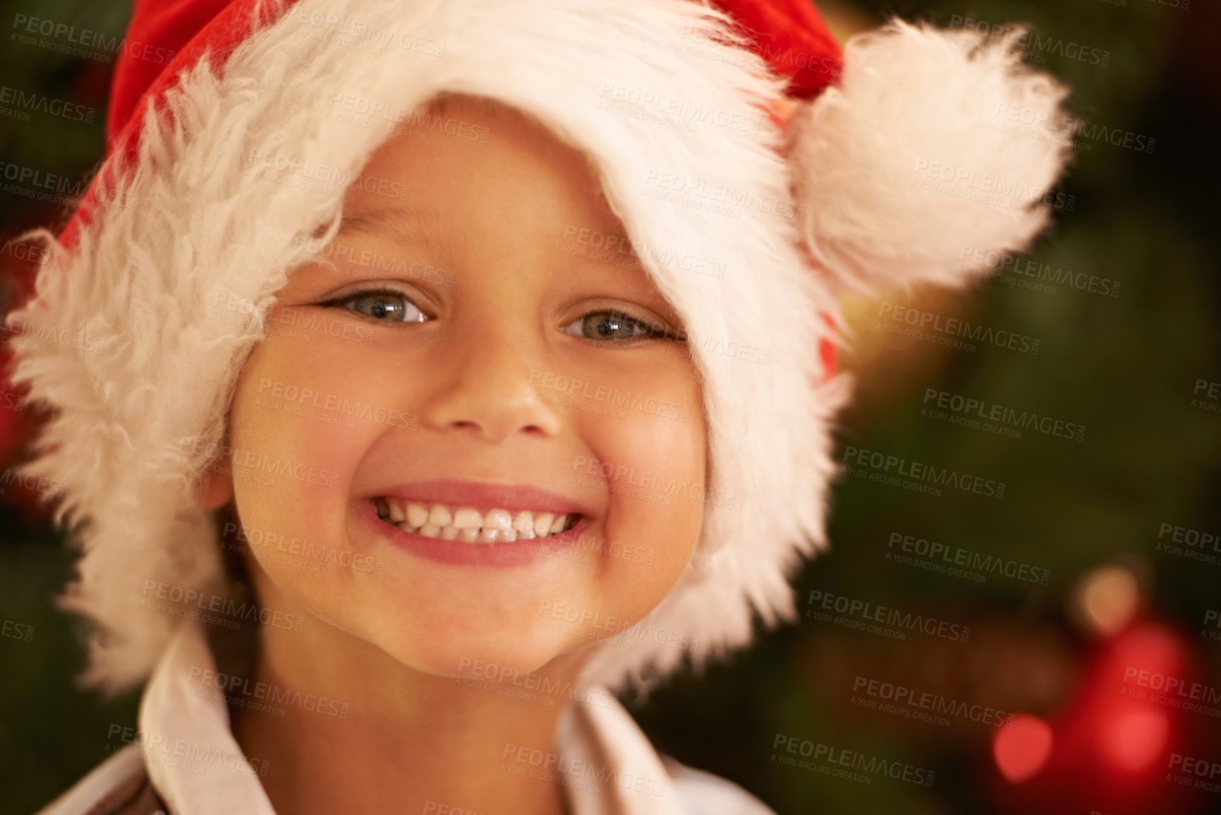 Buy stock photo Christmas, portrait and boy child, santa hat and celebrate winter holidays, happiness and joyful time. Happy kid, smile face and xmas festive red cap, costume and fun, excited and youth celebration 