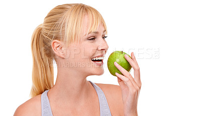 Buy stock photo Face, smile and woman with apple for diet, benefits or food to lose weight in studio. Healthy eating, nutrition and happy girl with fruit for body wellness, digestion and thinking on white background