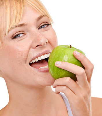 Buy stock photo Portrait, nutrition and happy woman with apple for diet, benefits or food to lose weight in studio. Healthy eating, smile and face of girl with fruit for body wellness, digestion and white background