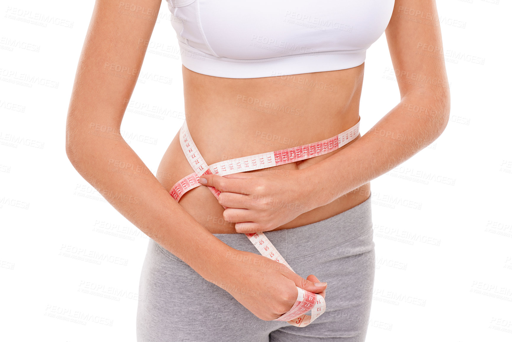 Buy stock photo Woman, stomach and measure in studio for health, fitness and track for weight loss. Female person, results on progress and nutrition for slim body, abdomen and workout isolated with white background