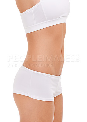 Buy stock photo Body, beauty and woman in underwear for health, wellness and lose weight for care isolated on a white studio background. Panties, bra and stomach of young model, waist and abdomen with slim figure