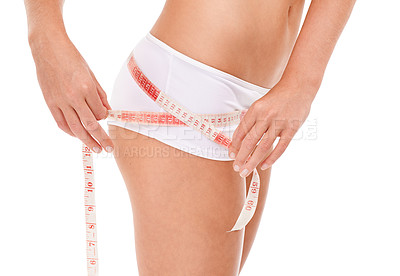 Buy stock photo Hands, health and tape measure with underwear woman in studio isolated on white background for weight loss. Exercise, fitness and wellness with person measuring waist if body to track diet progress