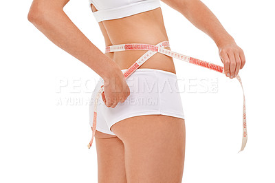 Buy stock photo Woman, wellness and tape measure for health, fitness and studio for workout and body care with weight loss. Female person, waist and white background for diet, results and natural in underwear