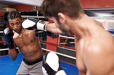 Buy stock photo Men, boxing ring and fight punch for workout competition for professional athlete for endurance, performance or exercise. Male people, gloves and combat sport for training practice, defence or gear