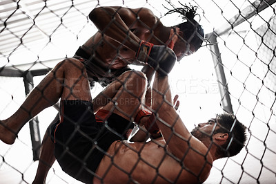 Buy stock photo Punch, cage and men sparring for kickboxing competition, challenge and fitness with fight sports in gym. Boxing match, strong fighter and knockout with exercise, practice and power in battle together