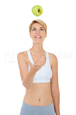 Buy stock photo Healthy woman, apple and fitness in wellness studio, weight loss and nutrition with white background. Female model, diet and throwing fruit with fibre, active and happy for body health with mockup