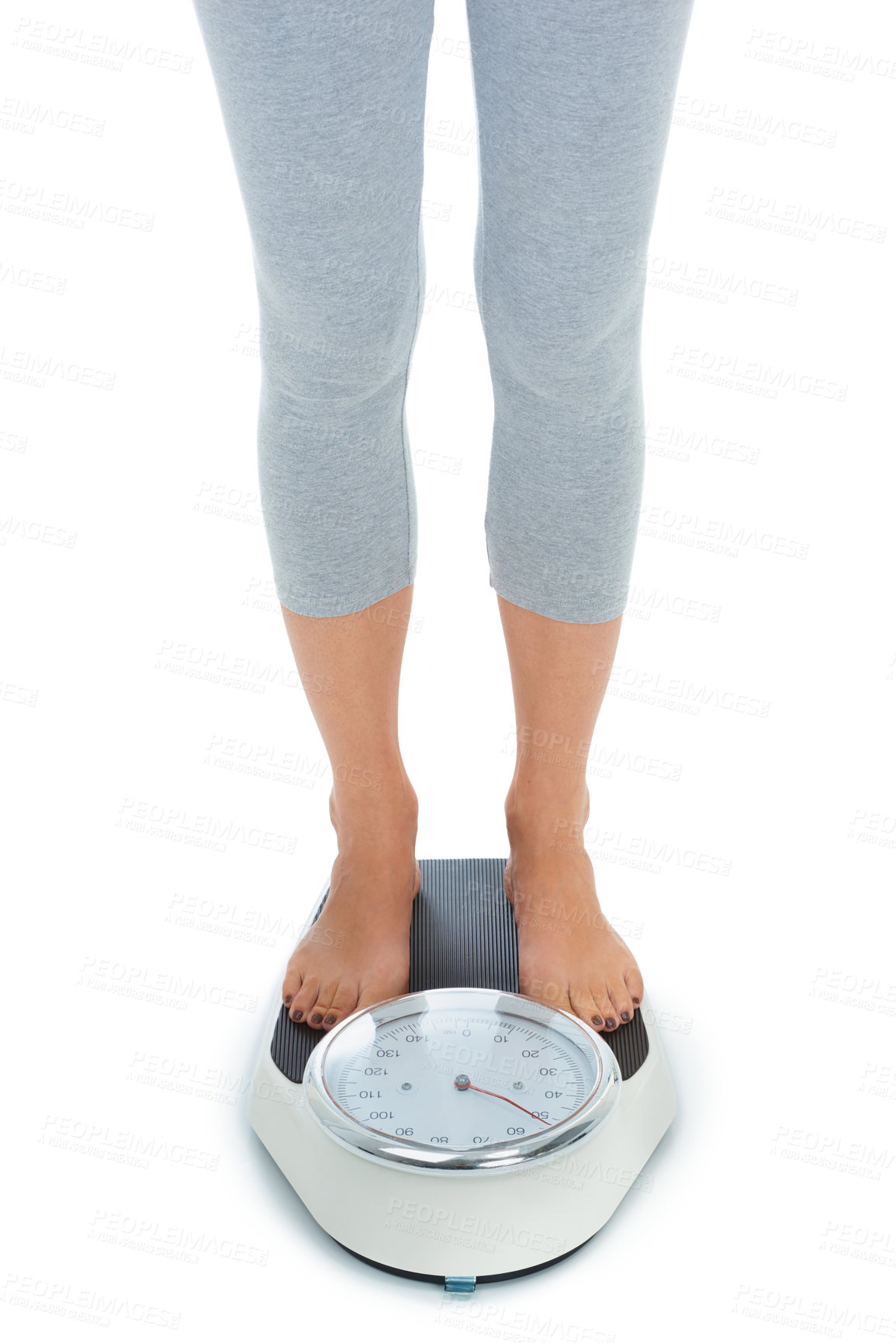 Buy stock photo Woman, legs and scale in studio for weight loss, healthcare and wellness for vitality. Female person, diet and check calories for slim body for self care, achievement and closeup on white background