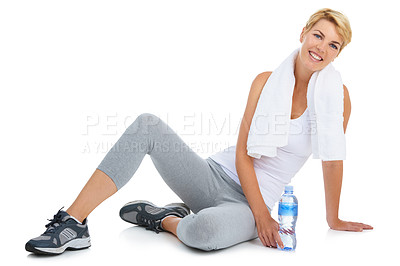 Buy stock photo Woman, exercise and water bottle in portrait in wellness studio, fitness and workout on health mockup. White background, smiling girl and drinking liquid for cardio recovery, dehydration and rest