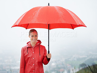 Buy stock photo Woman, portrait and umbrella for security, outdoor nature and protection from rain in weather. Female person, insurance and safety or shield from storm, winter and travel to Scotland for holiday