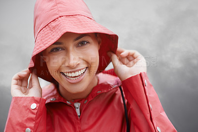 Buy stock photo Happy woman, portrait and rain jacket with hat for weather, cloudy sky or winter season in outdoor storm. Face of female person with red waterproof coat and smile for protection, fog or cold overcast
