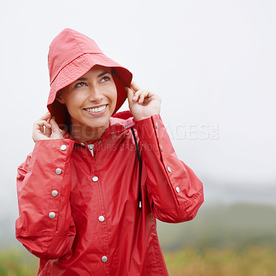 Buy stock photo Woman, smile and raincoat for protection, outdoor nature and waterproof jacket for rain or weather. Female person, happy and safety or shield from cold, winter and travel to Scotland for holiday
