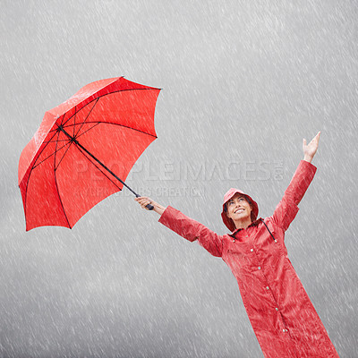 Buy stock photo Woman, rainfall and umbrella for protection, outdoor nature and security from rain in weather. Female person, insurance and safety or shield from storm, winter and travel for holiday or vacation