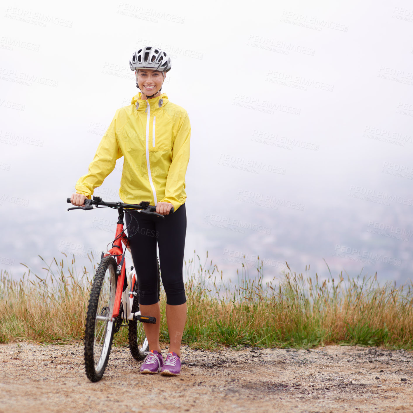 Buy stock photo Portrait, smile and woman with bike in mountains for morning exercise, training or off road hobby. Cycling, fitness and sports with happy young athlete in countryside or nature for workout ride