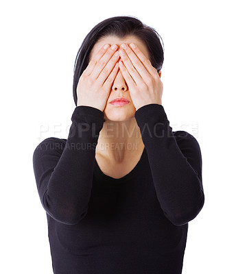 Buy stock photo Woman, covering eyes and secret with fear, anxiety and person isolated on a white studio background. Model, mockup space and girl with hand gesture and scared with horror, stress and panic attack