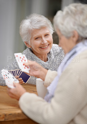 Buy stock photo Happy, game and portrait of old people playing cards for happiness and enjoyment in a nursing home. Smile, hobby and content senior women together for poker, card games and relaxing in retirement