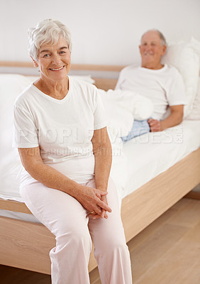 Buy stock photo Senior, couple and portrait or happy in bedroom for relax, retirement and pyjamas in hotel in the morning. Elderly, man and woman on bed with face, smile and hospitality in resort or accommodation
