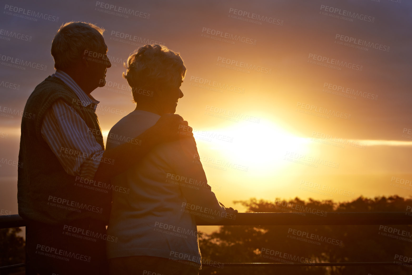 Buy stock photo Senior couple, sunset and relax on balcony in outdoor, bonding and love on vacation or holiday. Retirement, elderly people and dusk on terrace and together in nature, security and travel for marriage