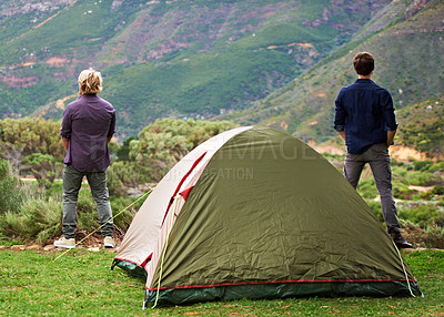 Buy stock photo Two men relaxing at their campsite