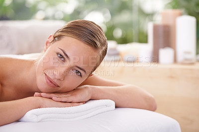 Buy stock photo Woman, spa and luxury resort for wellness, health and self care for relaxation and portrait and therapy. Female person, massage table and body treatment for serenity, skincare and detox to destress 