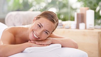 Buy stock photo Woman, spa and smile for wellness, health and self care for relaxation and portrait and therapy. Female person, luxury resort and body treatment for serenity skincare and massage table to destress 