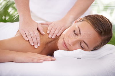 Buy stock photo Spa, face and woman or hands with massage for relax, luxury treatment and satisfaction with towel. Person, calm and masseuse for body care, pain relief and comfort with smile, wellness and skincare