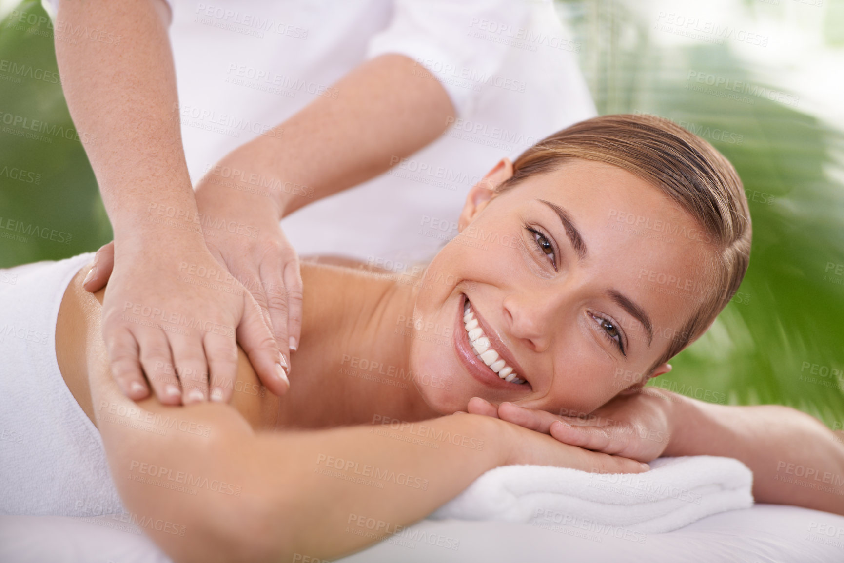 Buy stock photo Happy, portrait and woman or hands with massage for relax, luxury treatment and satisfaction at spa. Person, face and masseuse for body care, pain relief and comfort with smile, wellness and skincare