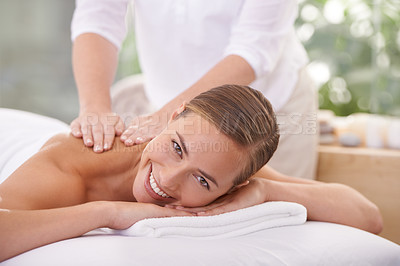 Buy stock photo Woman, portrait and wellness at spa for massage, health or skin care for luxury, physical therapy or peace. Female person, happy and relaxed for lifestyle, body or wellbeing on table, calm or natural