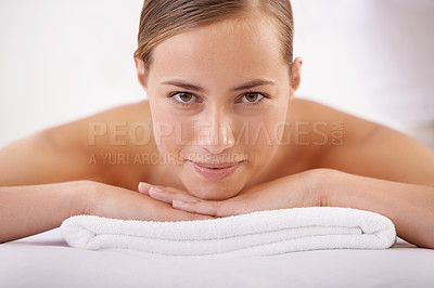 Buy stock photo Massage, smile and portrait of woman on table for luxury, treatment and pamper with peace in hotel spa. Female person, bed and resort with body care for cosmetic, wellness and rest on vacation
