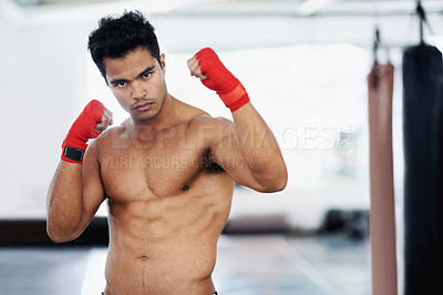 Buy stock photo Portrait, man and boxer in gym for sports, training or competition for body health. Fighter, athlete and serious person with muscle on abs for fitness, exercise and martial arts at club in Brazil