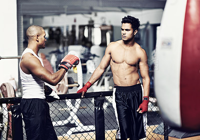 Buy stock photo Exercise, talking and fighter in gym with coach for training, self defense or combat training. Fitness, sports or boxing with shirtless man and personal trainer in preparation for competition