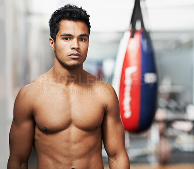 Buy stock photo Sport, training and portrait of man in gym for exercise, practice or wellness for physical health. Personal trainer, face and serious expression with confidence for boxing, fight skill or development