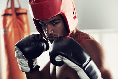 Buy stock photo Sports, portrait and man boxer in gym for exercise, workout and combat training for competition. Breathing, health and shirtless male athlete fighter in boxing ring with gloves in fitness center.