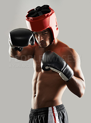 Buy stock photo Man, portrait and in studio with boxing gear for safety while fighting, tough and serious for competition. Male person, protection wear and ready for self defense match, mma and physical sports