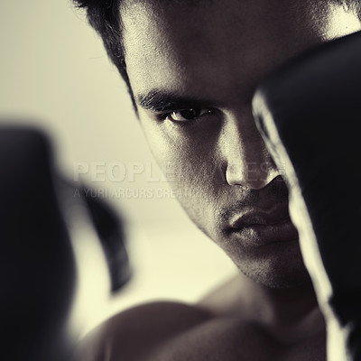 Buy stock photo Portrait, man and serious boxer for fight, training and workout for body health isolated on a grey studio background. Sports, face and athlete in gloves ready for fitness or exercise in Brazil