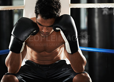 Buy stock photo Boxer, man and gloves in boxing ring for training, workout and relax for performance with rest and fitness. Professional fighter, athlete or exercise for competition, match or sport with healthy body