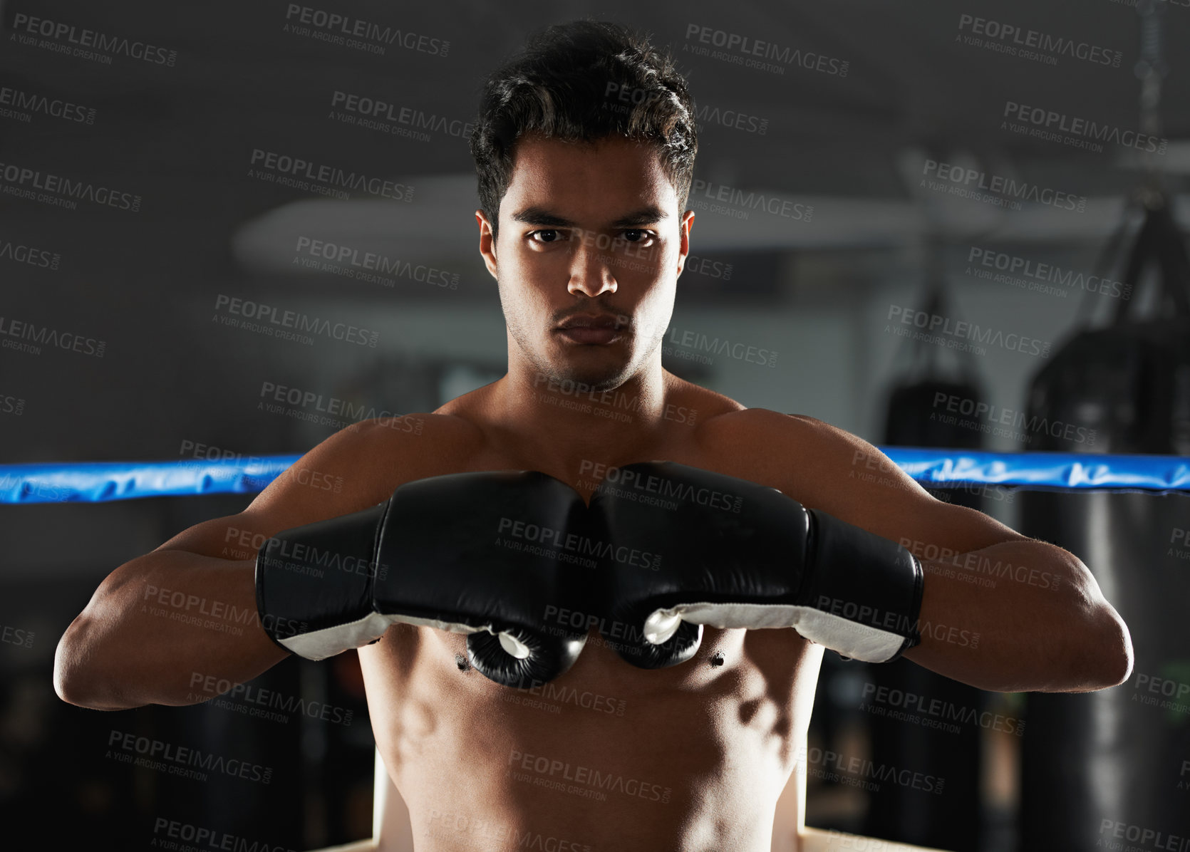 Buy stock photo Boxer, man and gym with sport, boxing ring and confidence for workout or training. Person, exercise and fitness for health, wellness and motivation for winning with commitment for professional fight