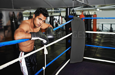 Buy stock photo Fitness, portrait and man boxer in gym for exercise, workout and combat training for competition. Cardio, health and shirtless male athlete fighter in boxing ring with gloves in sports center.