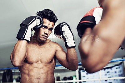 Buy stock photo Boxer, man and fight in boxing ring for workout, training and confidence for performance with coach or fitness. Professional, athlete or exercise for competition, match or sport with personal trainer