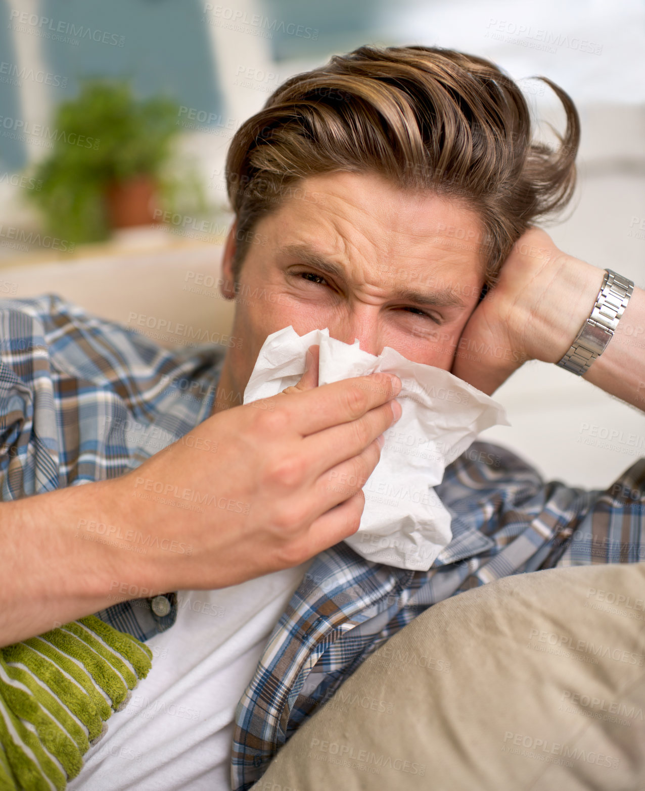 Buy stock photo Flu, tissue and portrait of man on sofa with cold, influenza and virus infection at home. Sick, allergies and person with handkerchief or toilet paper for sneeze, bacteria or sinusitis in living room