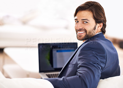 Buy stock photo Happy, portrait and businessman with remote work on sofa with laptop in home or living room. Entrepreneur, smile and working in lounge with computer for online research, report or journalist writing