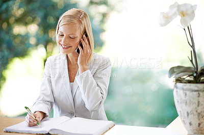 Buy stock photo Woman, phone call and receptionist taking notes, smile and listening to contact. Cellphone, notebook and female secretary writing, booking schedule and appointment for hotel, spa and communication.