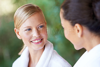 Buy stock photo Women, friends and spa with morning, hotel and bathrobe from wellness and skincare treatment. Relax, happy and smile from bonding and people with hospitality at lodge with luxury care outdoor